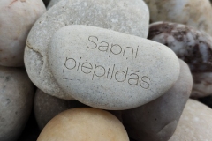 Gravēts teksts akmenī