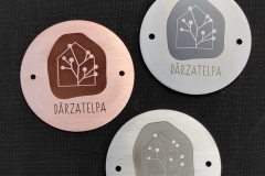 GRAVĒTS UN MARĶĒTS LOGO