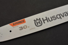 Gravējums uz zāģa