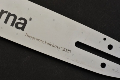 Gravējums uz zāģa