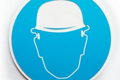 Brīdinājuma zīme -Jālieto aizsargķivere